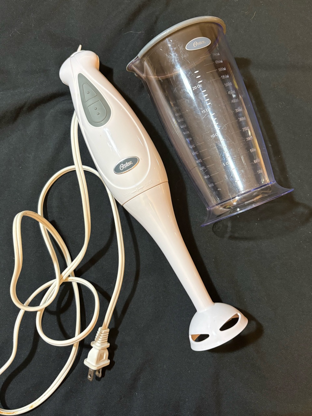 Oster hand held blender with cup